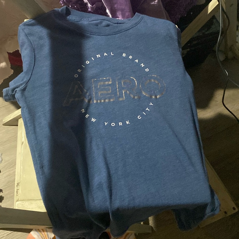 A blue Aeropostale shirt with print that says original brand New York City